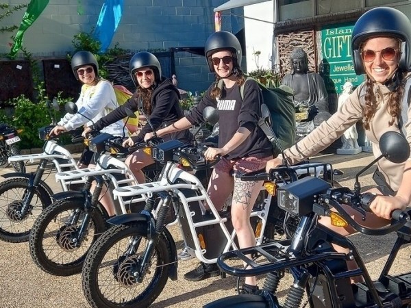 a person riding on the back of a motorcycle