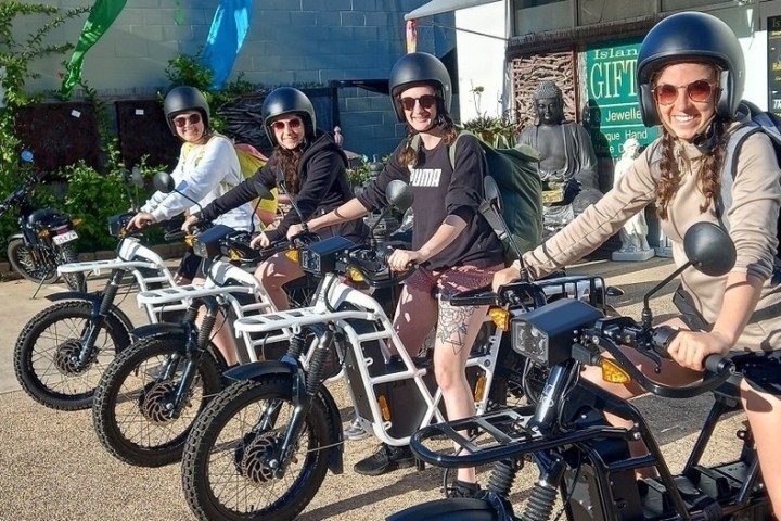 a person riding on the back of a motorcycle