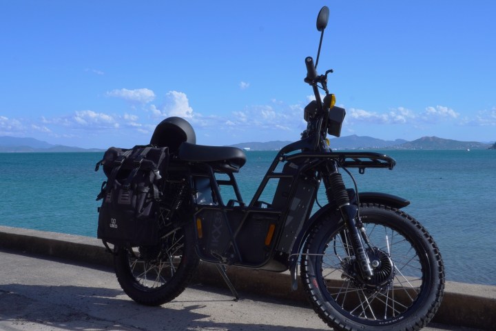 a bicycle is parked next to a body of water