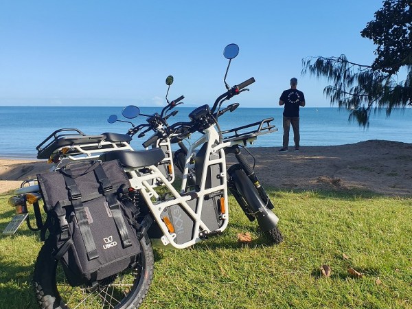 a bicycle parked on the grass