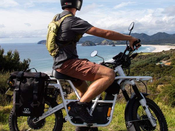 a man sitting on a motorcycle