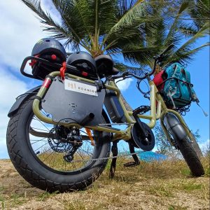 a motorcycle is parked on the side of a dirt field